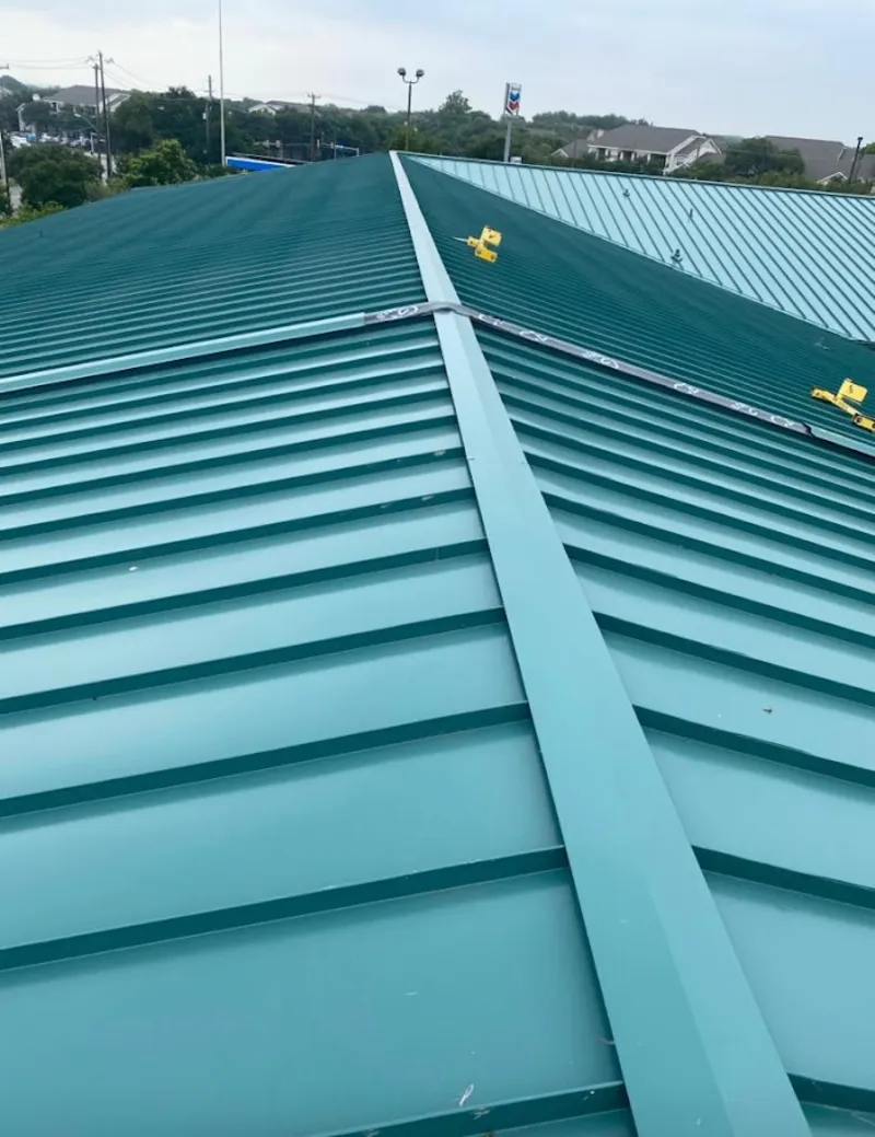 Green commercial metal roof ridge and valley for Metal Roof Repair in Longwood