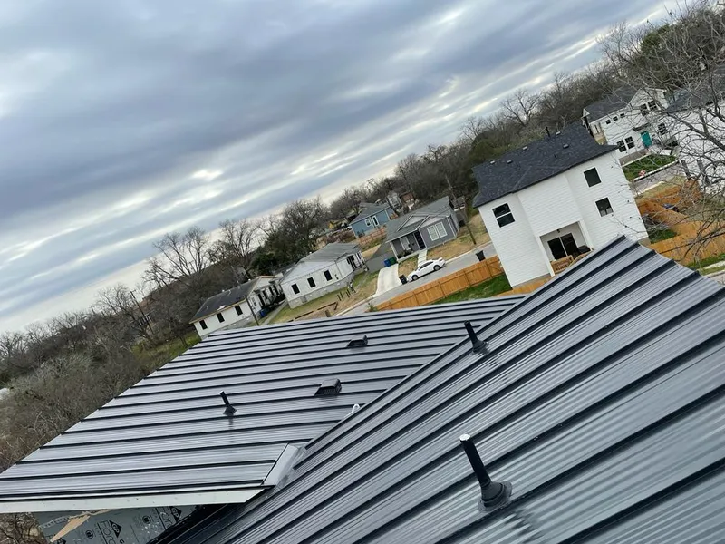 Standing seam metal roof panels with vents for Skylight Repair in Longwood